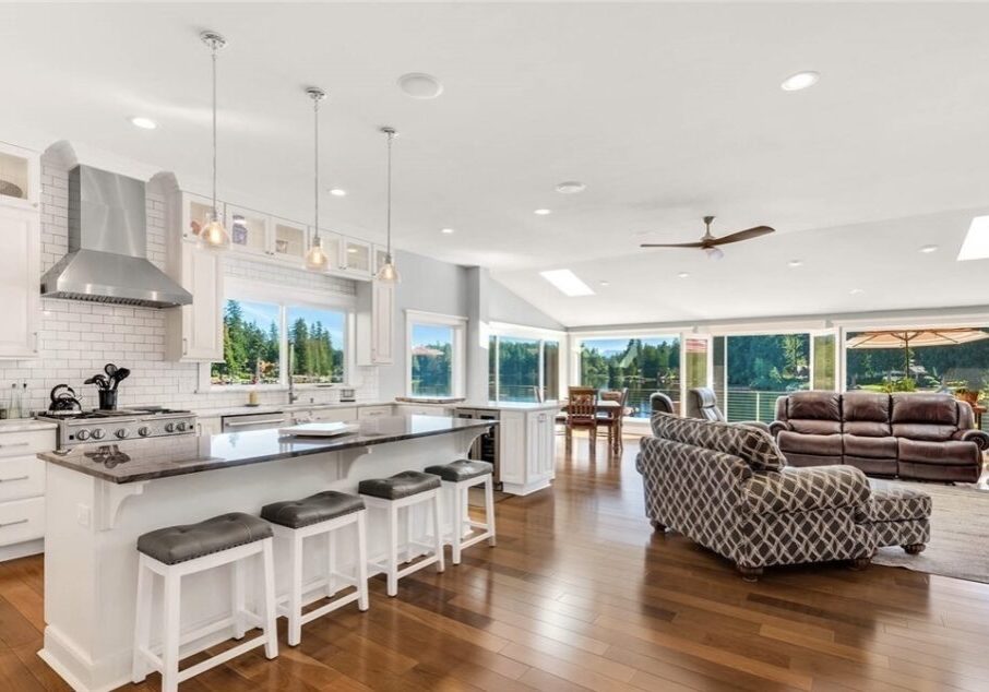 Spacious kitchen and living room with view.